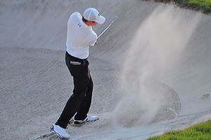 DSC_0587  Matthew Fitzpatrick splashes out of the sand on 18 on his way to victory in Dubai  Nov 2016